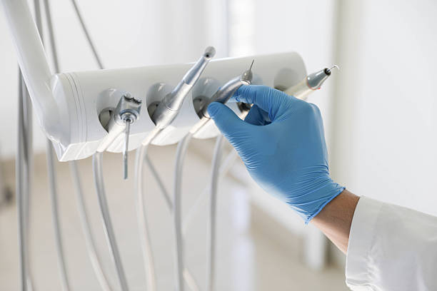 Professional Tooth Extraction technician working in Dryden, MI
